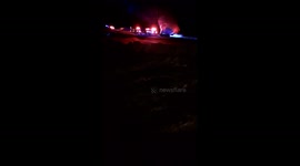 Accelerants used in truck fire. Multiple cops at crime scene..  unsafe for cars to pass  . On fire and  gas tank and other things still igniting on Leeds junction rd