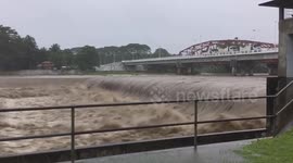 Rivers dangerously swollen as Tropical Depression Vicky batters Philippines