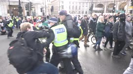 Anti-lockdown protesters clash with London police as UK orders shops to close, cancels holiday mixing for millions