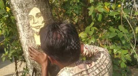 Indian artist carves face of Kamala Harris into tree trunk to congratulate VP-elect's victory