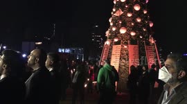 Victims of deadly Beirut blast demand justice for fallen family in Christmas-themed protest