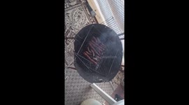 a bosnian man lockdown preparing a barbecue on the balcony as the corona virus pandemic arose.
