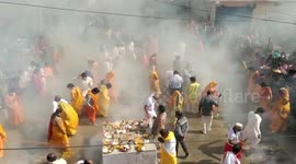 Devotees walk on flames hoping to grant their wishes in Indian temple