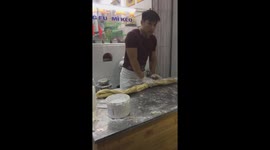 Vietnamese street chefs are talented in making noodles from wheat flour like they are practicing kungfu