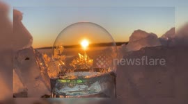 Watch ice crystals form on the surface of a bubble as it freezes in real-time!