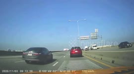 Pickup truck pushes Aussie driver into concrete barrier before spilling boxes onto road