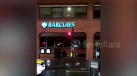This is the moment a group of police officers pinned down a man who had been seen with two blades include a huge knife