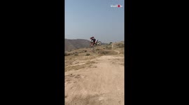 Guy overshoots the jump and crashed his bike