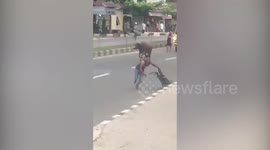 Escaped buffalo rampages through street in Indonesia