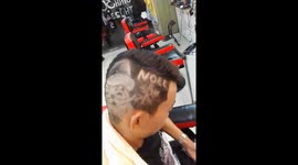 Vietnamese barber shaves Santa Claus into man's head for Christmas