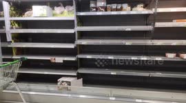 Christmas Eve Shoppers Strip Shelves