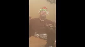 Dad discovers music elf hat