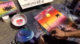 Spray Paint Art: Man skilled in drawing pictures with stunning spray paint and attracting viewers