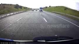 BMW UNDERTAKES ON HARD SHOULDER TO GET AHEAD