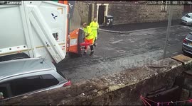 RECYCLING LORRY BACKS INTO MY WIFES CAR
