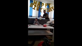 The boy at the party did not blink from the bursting of the balloon.
