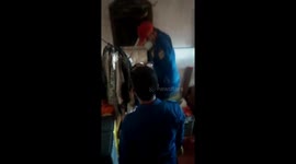 East Jakarta firefighters evacuate a 4 meter long python into a resident's house
