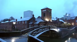 Birmingham's city centre canals dusted with post-Storm Bella snow