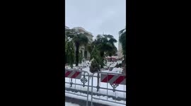 Snowing in Piazza Duomo, Milan
