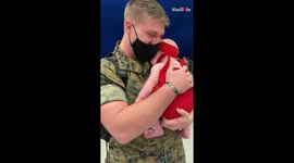 US Marine meets 4-month-old daughter for the first time