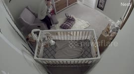 Ninja Baby flies from moms arm but mom catches him