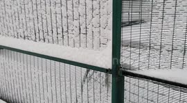 Heavy snow in Macclesfield stops cage football as northern UK hit by blizzards