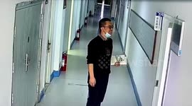 Heartwarming moment tired teacher practices his happy face before entering classroom