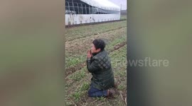 Chinese farmer prays after 8000 chickens perish in sudden cold weather