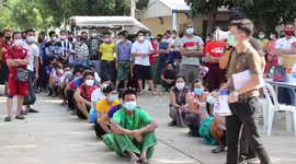 Burmese workers at seafood markets in Thailand checked for COVID-19 after surge in cases