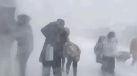 Chinese students have to battle Arctic-like snowstorm to get to class