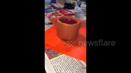 Stand for jewelry made of polymer clay in the shape of a cactus