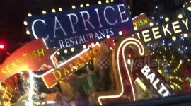 A glimpse  of Christmas sleigh in Knightsbridge out of a bus window