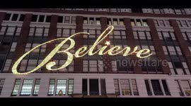 Twinkle lights and Christmas music fill the streets of Manhattan, New York