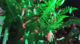 Unique Xmas tree decorated with masks, gloves and syringes in Southern India
