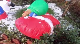 Funny inflatable Santa rises up