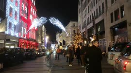 People Enjoy The Christmas Lights In Londoin Before They Come Down