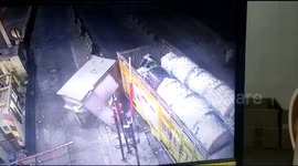 Toll booth worker narrowly avoids being crushed by truck in India