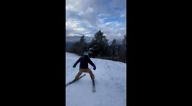 Adventurous skier lands on his head attempting backflip
