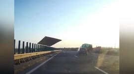 Plank smashes car windscreen after flying off truck in eastern China