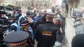 Police attempt to disperse protesters outside Old Bailey as Julian Assange extradition blocked