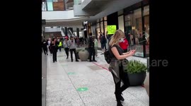 US: Anti-Mask Protesters Storm Shopping Center In Los Angeles 3