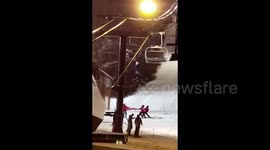 Cheers ring out as dangling skier caught by resort workers in upstate New York
