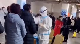 Crowds queue to be tested for coronavirus after 117 new cases emerge in four days in northern China