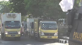 Indonesian Police Mobile Brigade Corps Guards Distribution of Covid-19 Vaccines with Complete Weapons