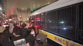 FILE: Hong Kong police round up dozens of pro-democracy politicians and activists