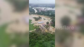 Aerial footage of flooded home in Malaysia as one person dies and thousands evacuated