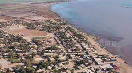 00:14 Aerial view of fishing boats in the mud or mud of the estuary in the community of Paredón Colorado or also called Paredón Viejo is a ranchería in the municipality of Benito Juárez, located in the south of the Mexican state of Sonora, on the coast