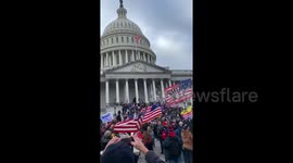 Trump supporters blow horns as they take over Capitol building