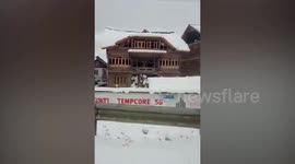 Entire roof of house COLLAPSES under the weight of heavy snowfall in Jammu and Kashmir