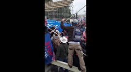 Trump supporters storm and barge into the Capitol building in Washington D.C.